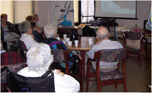 Seniors can hear a lecture given by a scientist from the Meadowlands Environmental Center by making use of videoconferencing technology.